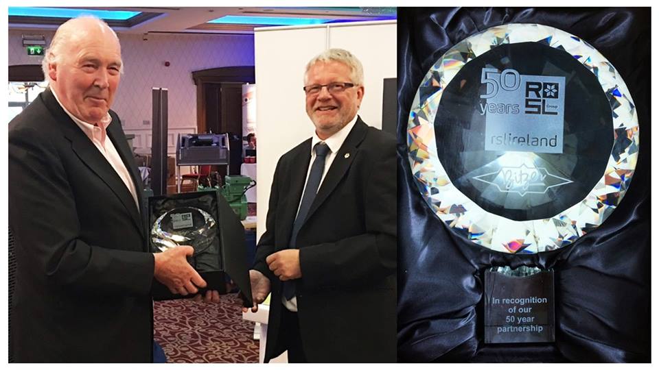 Gerry McDonagh receives gift from Kevin Glass, Managing Director of BITZER UK to commemorate 50 year partnership