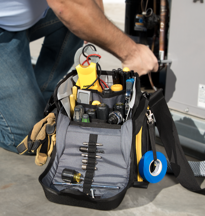Fieldpiece Tool organizer with various tools and equipment in a workshop setting