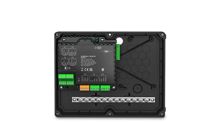 Black electronic module with green and white connectors on a white background