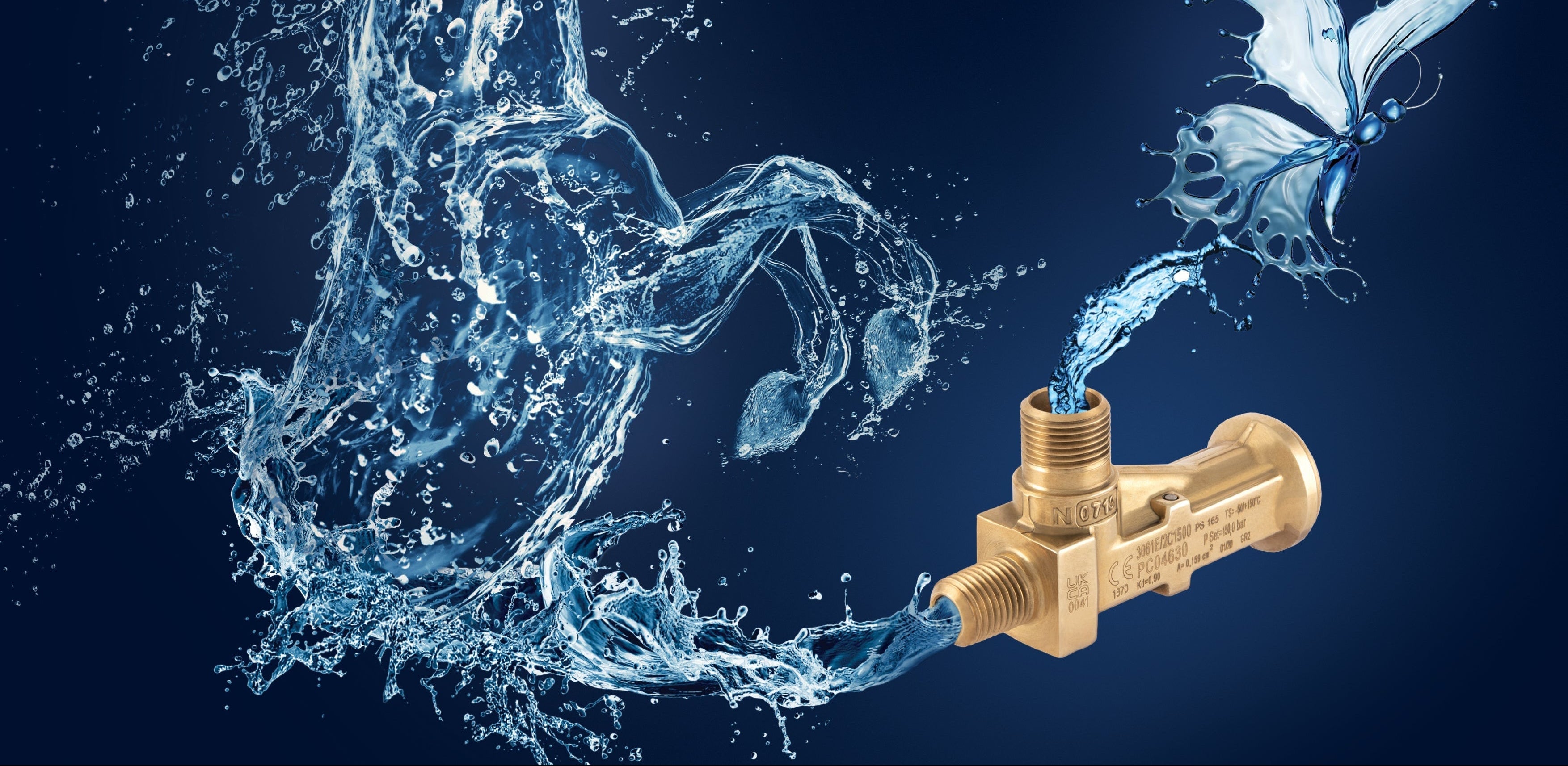 Gold castel valve with water flowing against a dark blue background