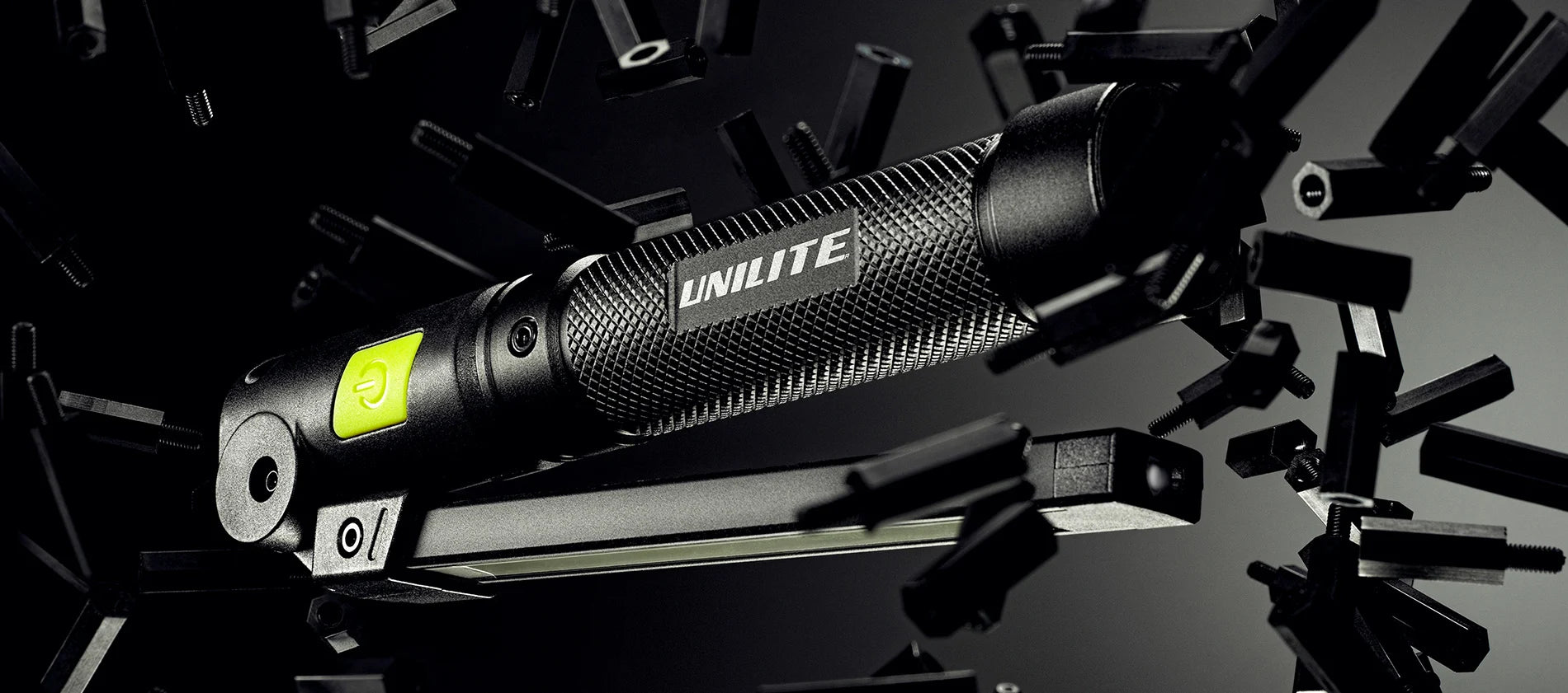 UNILITE flashlight on a black background with mechanical components
